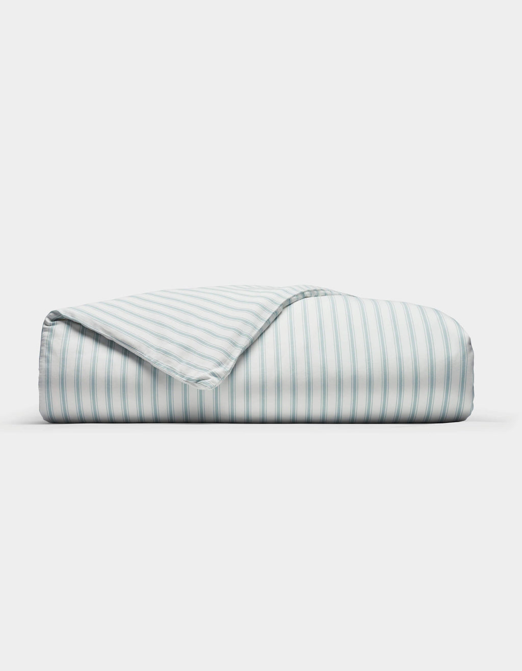 The Cozy Earth Soft-Wash Cotton Duvet Cover features neat light blue and white vertical stripes, displayed folded on a plain white background with one corner turned to show the underside pattern.|Color:River and Sea Salt Stripe