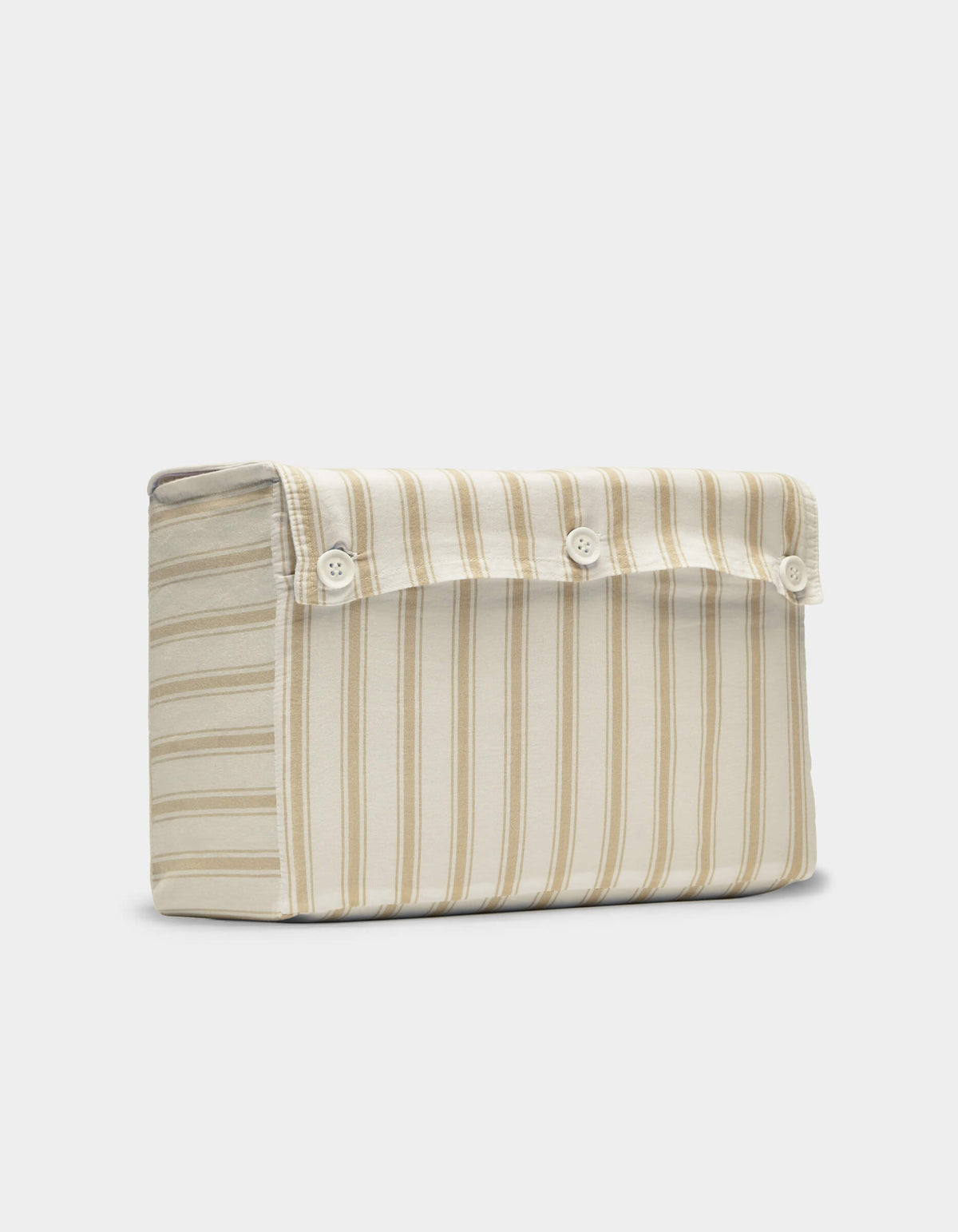 The Cozy Earth Soft-Wash Cotton Sheet Set is displayed upright against a plain, light background, showcasing its beige and cream vertical stripes and flap closure with three white buttons.|Color:Coconut and Sandalwood Stripe