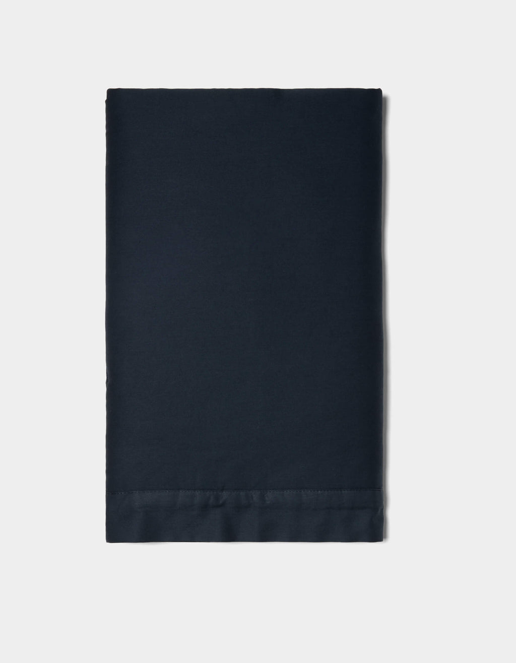 A neatly folded Soft-Wash Cotton Quilted Sham by Cozy Earth in solid dark navy blue is displayed on a plain white background.|Color:Eclipse