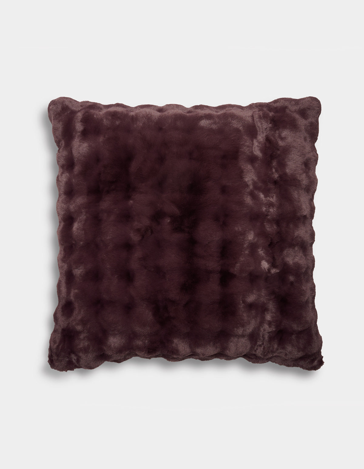 A square Bubble Cuddle Pillow by Cozy Earth, featuring dark purple faux fur with a soft, plush texture and slightly scalloped edges, displayed against a plain white background.|Color:Raisin |Size:36" x 36"