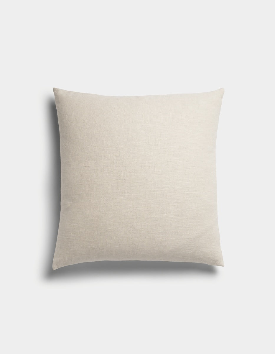 The Sonoma Throw Pillow by Cozy Earth features a square shape and light beige color with a smooth fabric texture, displayed against a plain white background.|Color:Canvas|Size:24" x 24"
