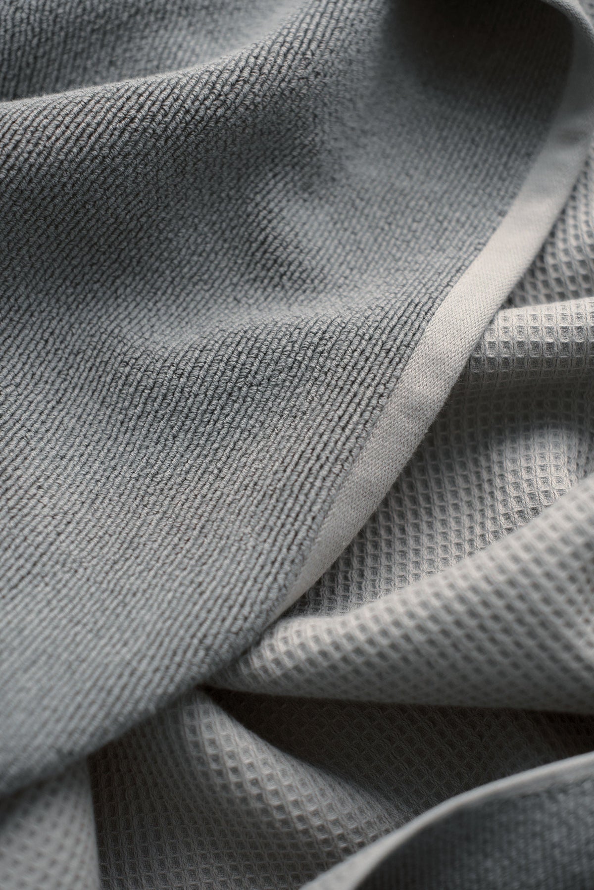 Waffle Bath Towel in the color Charcoal. Photo of Charcoal Waffle Bath Towel taken close up showing only the Charcoal. |Color:Charcoal