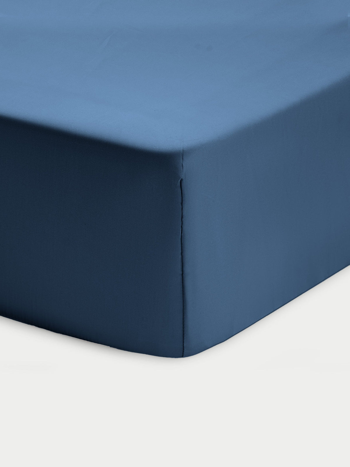 Corner of pacific blue crib sheet with white background |Color:Pacific Blue