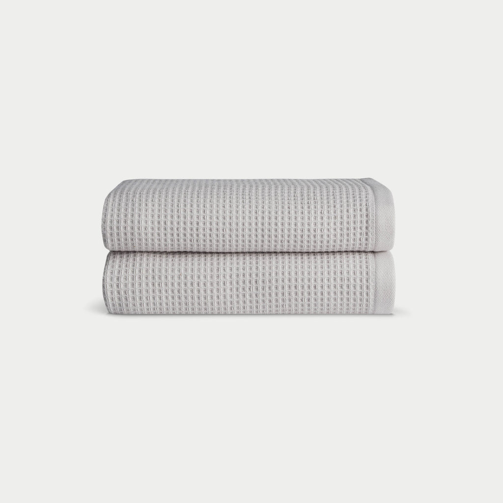 Light Grey Waffle Hand Towel set neatly folded. The photo was taken with a white background. |Color:Light Grey