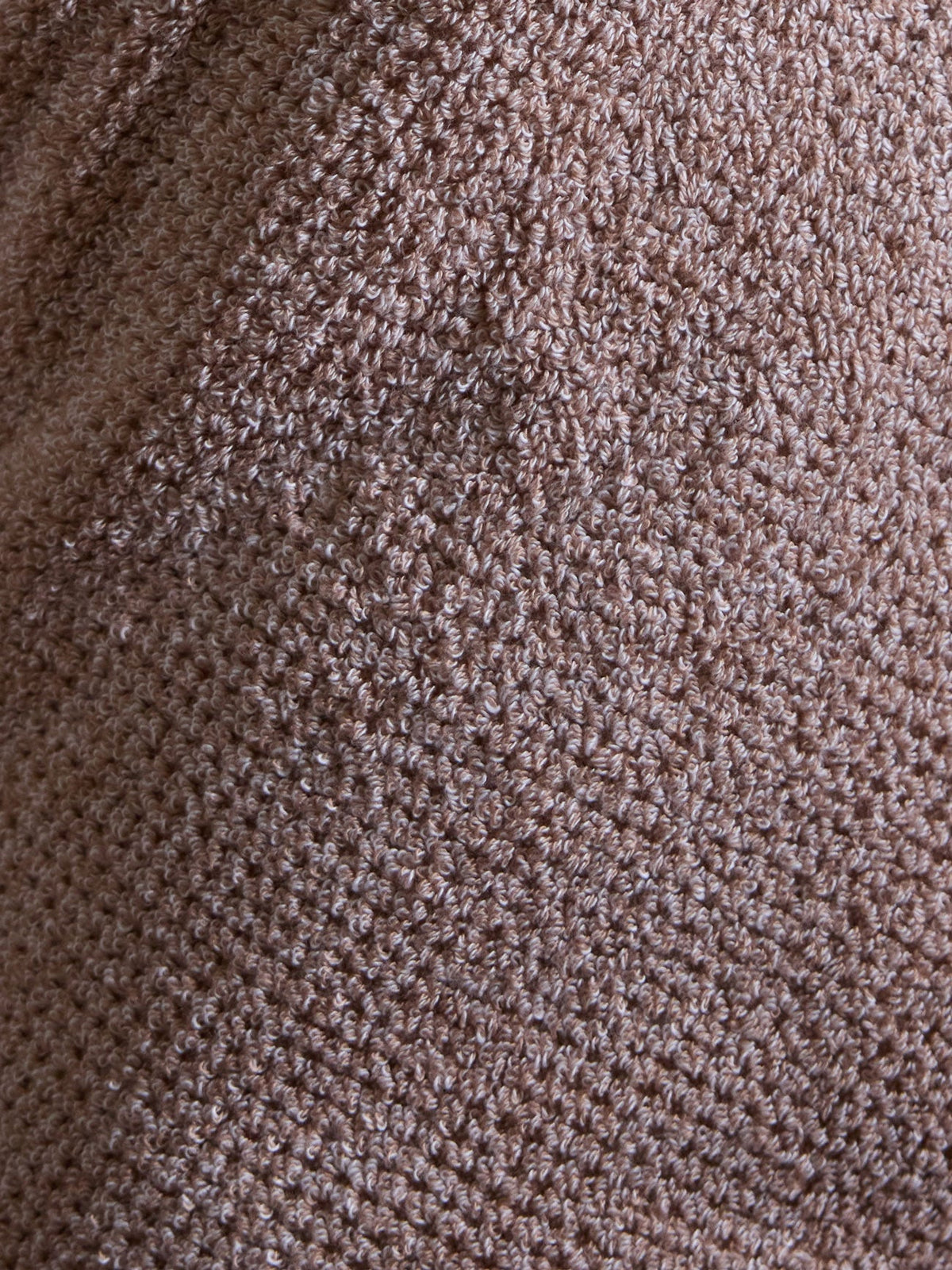 A closeup of the heathered clay Nantucket bath towel shows its soft and cozy texture. |Color:Heathered Clay